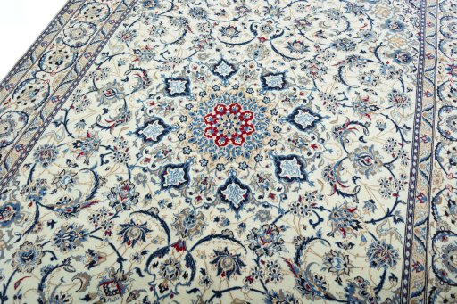 Backside of handmade 2000s Nain rug showing knot structure and weave density
