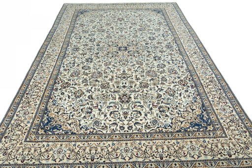 Surface texture of 2000s Nain rug with natural Wool and intricate pattern