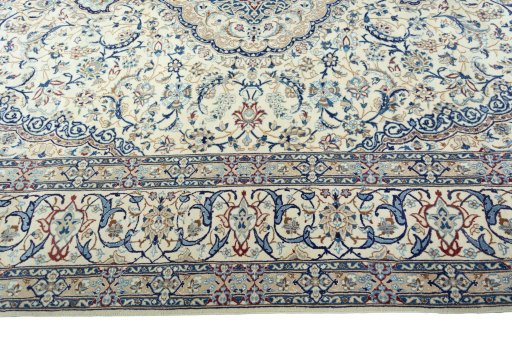 Corner detail of 2000s Nain rug showing border pattern and Wool pile