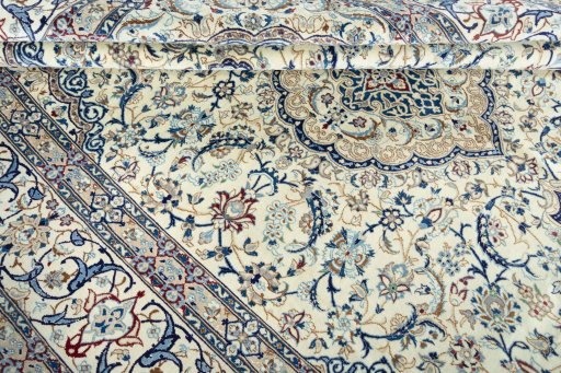 Close-up detail of 2000s Nain rug from Iran / Persia showing Wool weave
