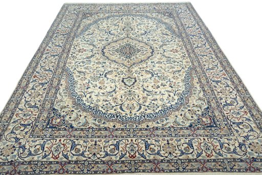 Surface texture of 2000s Nain rug with natural Wool and intricate pattern