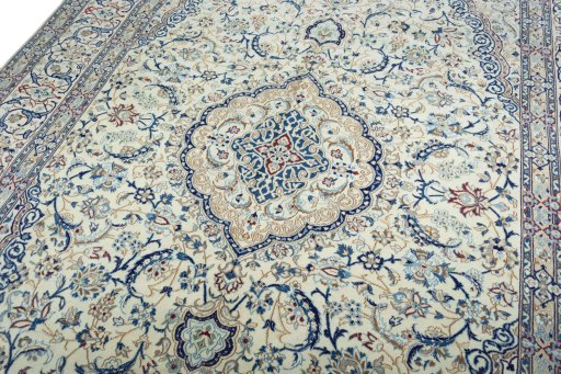 Backside of handmade 2000s Nain rug showing knot structure and weave density