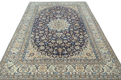 Surface texture of 1970s Nain rug with natural Wool and intricate pattern