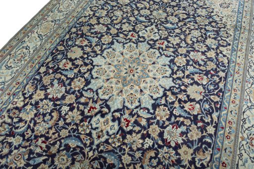 Backside of handmade 1970s Nain rug showing knot structure and weave density