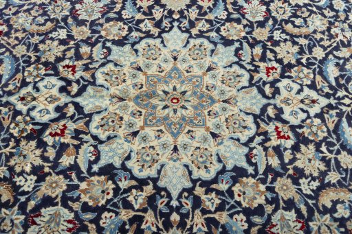 Central medallion detail of 1970s Nain rug from Iran / Persia