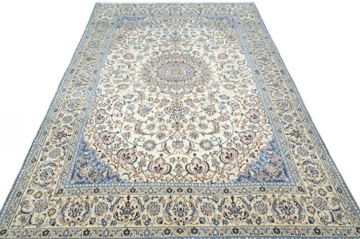 Surface texture of 2000s Nain rug with natural Wool and intricate pattern