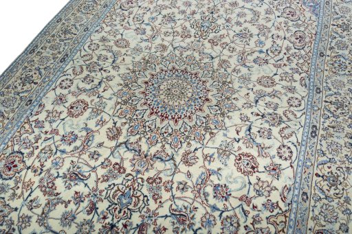 Backside of handmade 2000s Nain rug showing knot structure and weave density