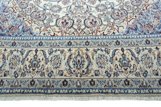 Full view of 2000s Nain rug from Iran / Persia, 322 × 198 cm in Beige tones