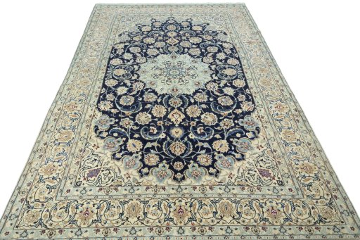 Surface texture of 2000s Nain rug with natural Wool and intricate pattern