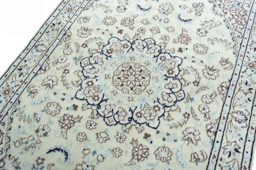 Backside of handmade 2000s Nain rug showing knot structure and weave density
