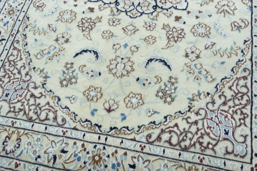 Close-up detail of 2000s Nain rug from Iran / Persia showing Wool weave