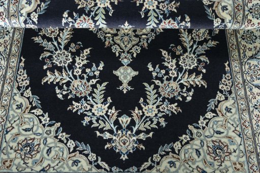 Corner detail of New Nain rug showing border pattern and Cork pile