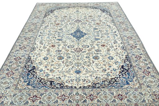Surface texture of 2000s Nain rug with natural Wool and intricate pattern