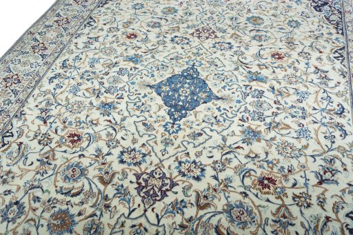 Backside of handmade 2000s Nain rug showing knot structure and weave density