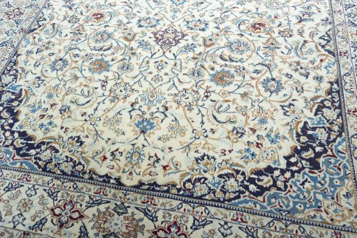 Close-up detail of 2000s Nain rug from Iran / Persia showing Wool weave