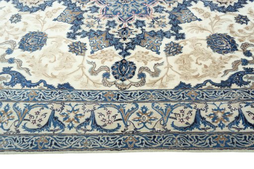 Corner detail of 2000s Nain rug showing border pattern and Wool pile