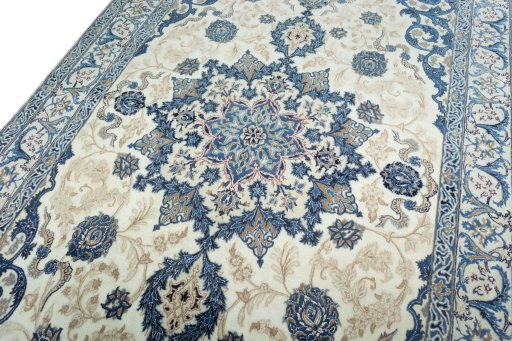 Backside of handmade 2000s Nain rug showing knot structure and weave density
