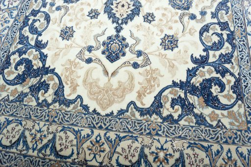 Close-up detail of 2000s Nain rug from Iran / Persia showing Wool weave