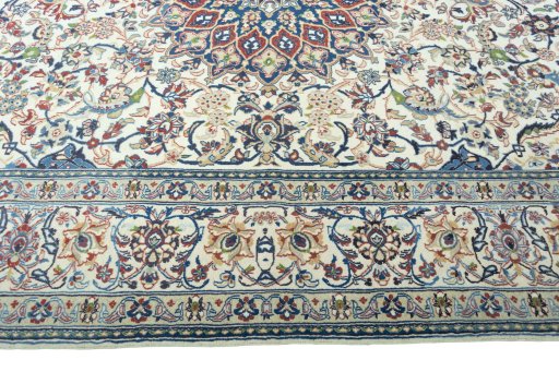 Corner detail of 2000s Nain rug showing border pattern and Wool pile