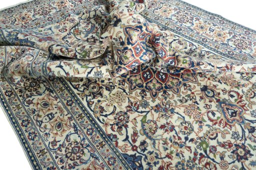 Surface texture of 2000s Nain rug with natural Wool and intricate pattern