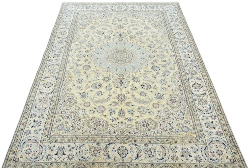 Surface texture of 2000s Nain rug with natural Wool and intricate pattern