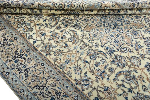 Close-up detail of 2000s Nain rug from Iran / Persia showing Wool weave