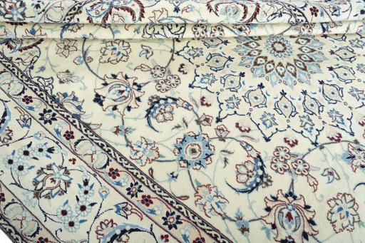 Close-up detail of 2000s Nain rug from Iran / Persia showing Wool weave