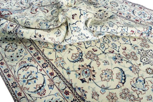 Surface texture of 2000s Nain rug with natural Wool and intricate pattern