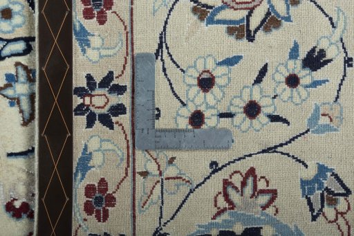 Backside of handmade 2000s Nain rug showing knot structure and weave density