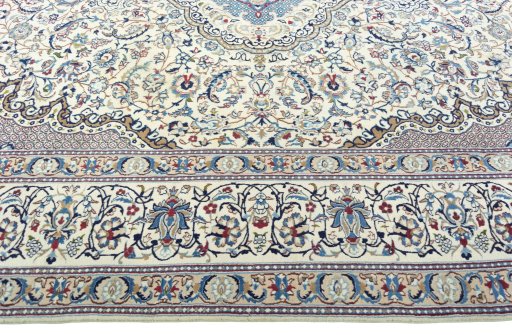 Corner detail of 2000s Nain rug showing border pattern and Wool pile