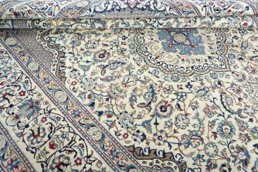 Close-up detail of 2000s Nain rug from Iran / Persia showing Wool weave