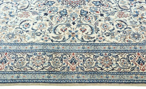 Corner detail of 2000s Nain rug showing border pattern and Cork pile