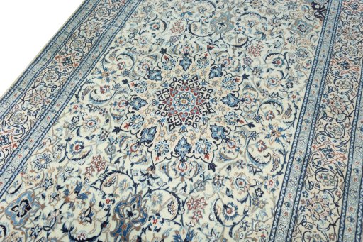 Backside of handmade 2000s Nain rug showing knot structure and weave density
