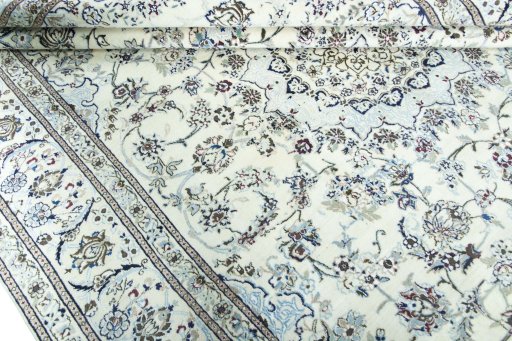 Close-up detail of 2000s Nain rug from Iran / Persia showing Wool weave