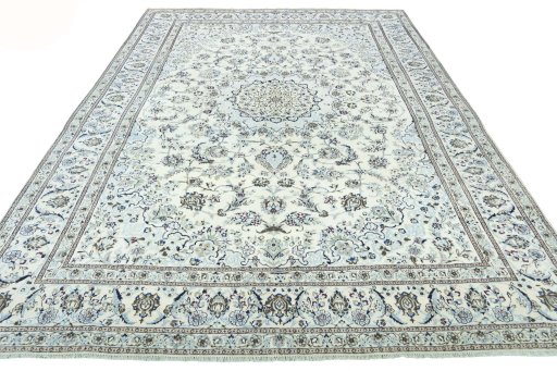 Surface texture of 2000s Nain rug with natural Wool and intricate pattern