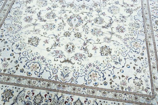Close-up detail of 2000s Nain rug from Iran / Persia showing Wool weave