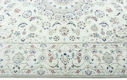 Corner detail of 2000s Nain rug showing border pattern and Wool pile