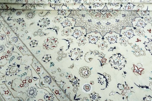 Close-up detail of 2000s Nain rug from Iran / Persia showing Wool weave