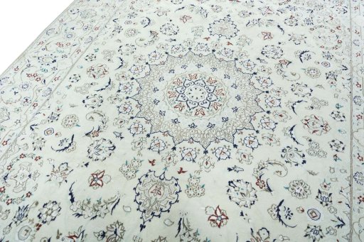 Backside of handmade 2000s Nain rug showing knot structure and weave density