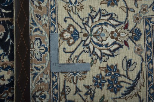 Close-up detail of 2000s Nain rug from Iran / Persia showing Wool weave