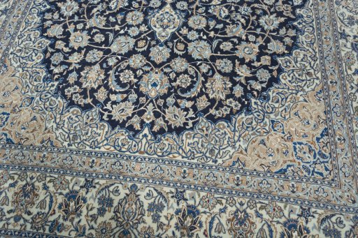 Backside of handmade 2000s Nain rug showing knot structure and weave density