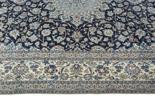 Close-up detail of 2000s Nain rug from Iran / Persia showing Wool weave
