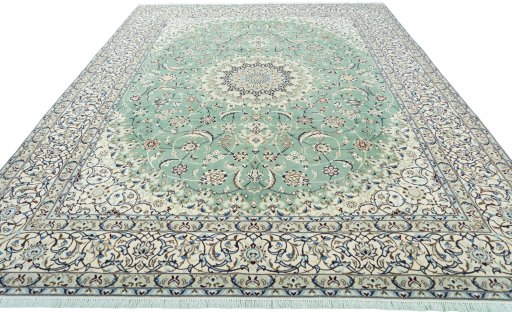 Surface texture of 2000s Nain rug with natural Wool and intricate pattern