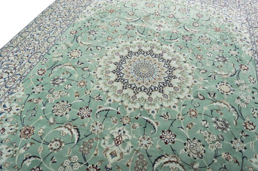 Backside of handmade 2000s Nain rug showing knot structure and weave density