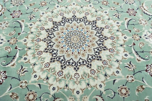 Central medallion detail of 2000s Nain rug from Iran / Persia