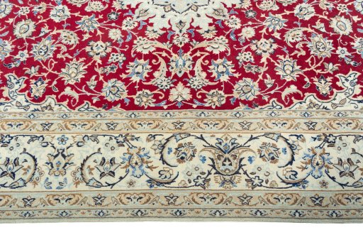Corner detail of 2000s Nain rug showing border pattern and Wool pile