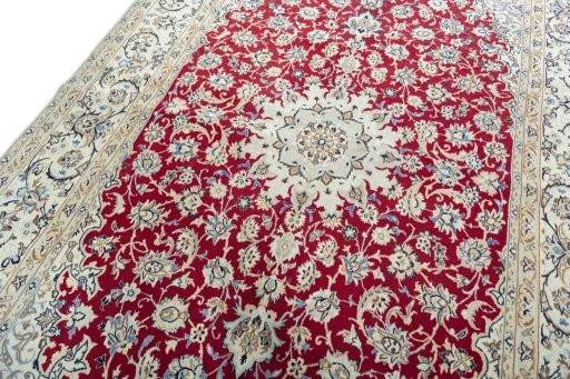 Backside of handmade 2000s Nain rug showing knot structure and weave density
