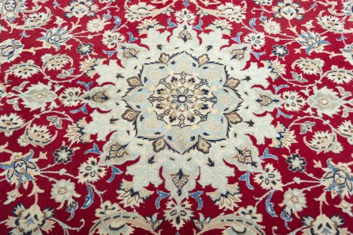 Central medallion detail of 2000s Nain rug from Iran / Persia