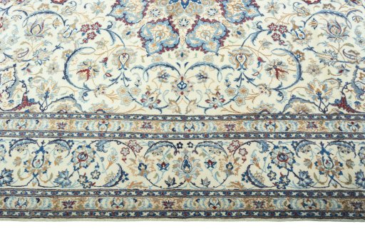 Corner detail of 2000s Nain rug showing border pattern and Wool pile