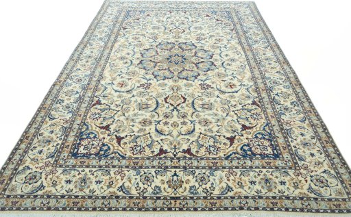 Surface texture of 2000s Nain rug with natural Wool and intricate pattern